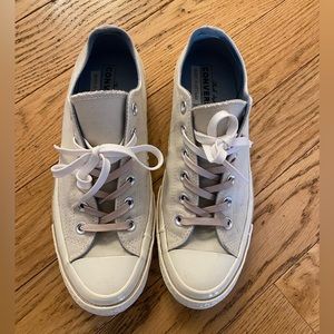 Beige, low top Converse sneakers. Worn only once!